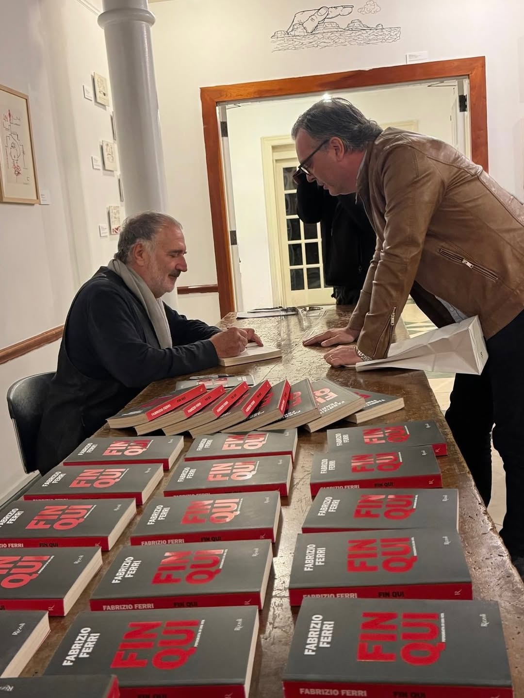 On October 9th, @fabrizioferriofficial presented his book FIN QUI (Till Here) at @casaitaliananyu, in a vibrant and heartfelt conversation with @graziadannunzio.

By his side, as always, his wife and partner in life, art, and business @industriasuperstudio, @geraldinapolverelliferri, curator of the powerful installation “Breathtaking”, a collection of portraits of friends and icons such as Willem Dafoe, @isabellarossellini, @juliannemoore, @theofficialsting, and many others. After its debut in Milan, “Breathtaking” is now in Venice, soon to travel to London and Paris.

A beautiful and attentive audience filled the room, embracing Fabrizio’s reflections, memories, and anecdotes, moments that flowed naturally between art, life, and the passage of time.

A heartfelt evening celebrating art, memory, and the beauty of a life lived “TILL HERE”…

Highlights of the evening:
1. Pillola of the presentation: Fabrizio Ferri sharing how he connected with the talents he portrayed.
2. A touching dialogue between Grazia D’Annunzio and Fabrizio Ferri, revisiting lifetime memories.
3. Fabrizio Ferri presenting FIN QUI.
4. Fabrizio remembering his childhood and the profound influence of his parents (in the photo, Fabrizio with Grazia D’Annunzio and a portrait of his father).
5. Fabrizio walking the audience through the concept and process behind Breathtaking (in the photo Fabrizio with Grazia D’Annunzio and Julianne Moore’s portrait in the background).
6. FIN QUI books displayed.
7. Fabrizio ready to sign copies of his book.
8. & 9. Moments of Fabrizio signing books for the guests.
10. A beautiful portrait of Fabrizio Ferri with his wife and curator of Breathtaking Geraldina Polverelli, and their friend and interviewer Grazia D’Annunzio.
11. Fabrizio Ferri and Geraldina Polverelli.
12. Fabrizio Ferri with Geraldina Polverelli, Grazia D’Annunzio, Zarifa Garofalo and Samuele Frimaio.

#FINQUI #NY #fabrizioferri #breathtaking #art #photography #memories