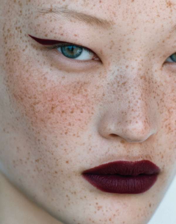 A vision drenched in velvet tones and whisp...