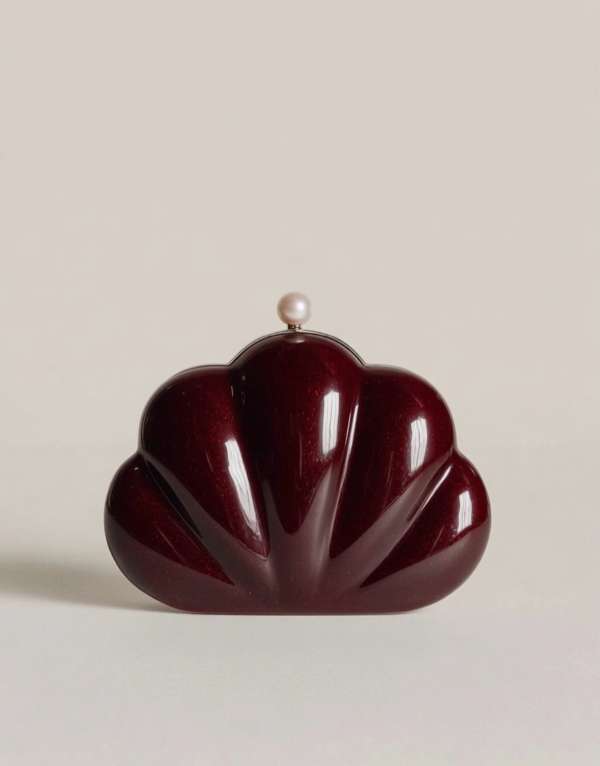 A vision drenched in velvet tones and whisp...