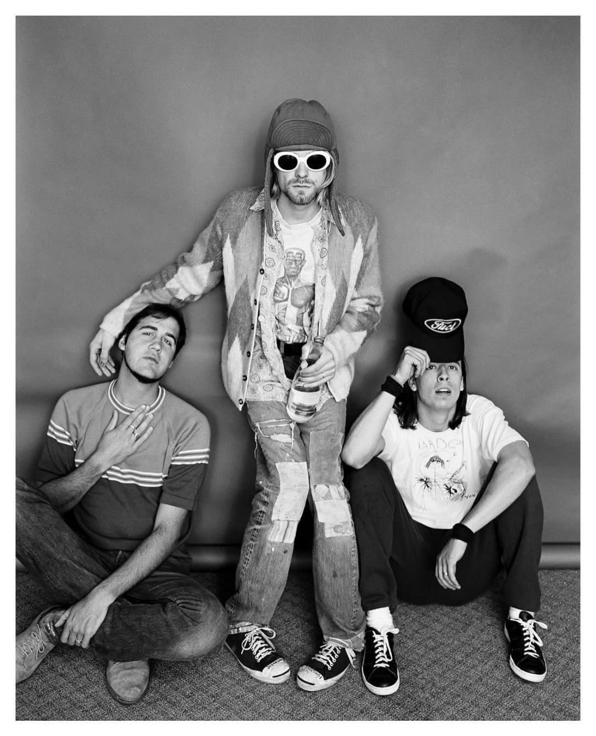 A presence that never faded.
Thirty two years later, the image is still haunting, iconic, and deeply alive.
#TBT

•••
#repost

@blendergallery “ The sun is gone, but I have a light”…
It’s been 32 years…. ❤️

Photographer Jesse Frohman recalls that day of April 5th 1994:

“It’s been 31 years when my day came to a screeching halt with a flood of phone calls from magazines and news outlets wanting pictures of Kurt. My assistants and I were working in the office producing a job. Vanity Fair was first to call, telling us that Kurt had just died. Then it was Rolling Stone, Spin, The New York Times, and many others calling to see this now famous shoot, but at the time I thought was just another shoot of a great band.
Interesting note that many of the magazines wanted to run the studio shots of Kurt on their covers, but Kurt never took off the sunglasses for that part of the shoot, and because it is important for magazines to have eye contact for their cover photos, not one magazine ran my pictures as a cover.

Kurt and I had a very brief relationship, crossing ships on our life journeys, and although I would not dare to say I knew the man, I got a distinct portrait, aside from the photos, of who he was. I cherish these moments with great artists and personalities, including James Brown, Little Richard and many others no longer with us.
We all have their music to enjoy and inspire us, and I also have the memories of shared moments of artist collaboration, and that is what I ultimately love the most about what I have been blessed to do.

So thank you to Kurt for sharing yourself with my camera so that I might memorialize you and that moment. Thanks also to Dave Grohl and Krist Novoselic for one of the greatest bands ever.”
Jesse Frohman

✨ RIP Kurt D. Cobain February 20 1967  April 5th 1994.. the world misses you 🕊️

Peace & much love ✌️❤️🎶