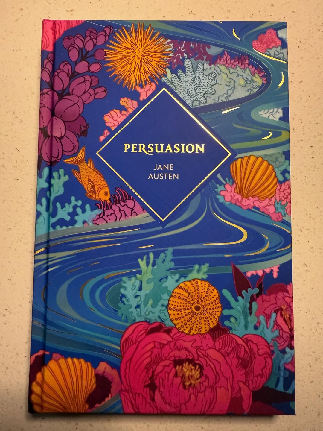 My latest cover of Jane Austen’s “Persuasion” for @penguinbooks UK hardback “Vintage Collector’s Classics.” 
Many thanks to AD’s Amelia Tolley and Yeti Lambregts for the fun collab and helping me to elevate the cover beyond my initial vision of it could be🫶🏽🙏🏽 (also it has gold foil emboss 💛).

On the carousel are pics of my process that began as a vector drawing, which was then blended with inked inked lines, printed out & painted on, and then I finally added more vector lines and shapes to make it feel cohesive, bringing all the parts altogether.
#illustration #books #bookcover #persuasion #janeausten #ink #vector #penguinclassics
