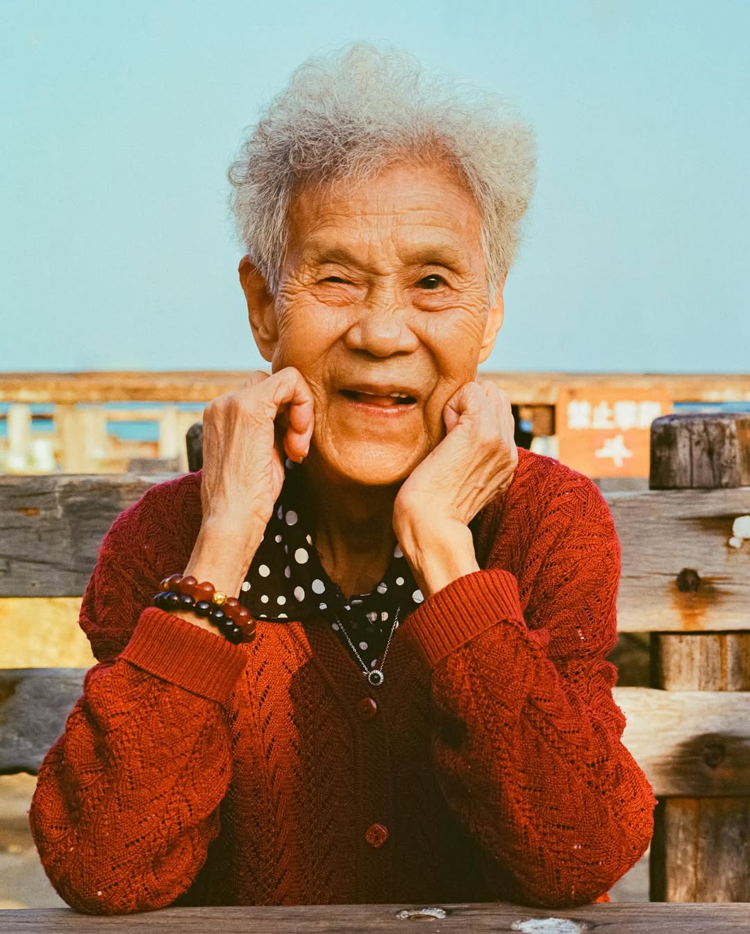 Unforgettable (China, Feb 2024) by @yanran.xiong 

“Grandma has drifted in Alzheimer’s haze for years.
She once hid money in her underwear, cursing anyone who tried to take it.
Unfamiliar places made her afraid; some nights, she tried to escape.
But always, she carried sunflower seeds to share,
and memories of dancing and singing—her youth shining through.
She no longer knows our names, yet greets each day with a radiant smile,
at peace in a world that forgets, but never dims her light. 

I want to capture these precious moments because I don’t know how many there still are.”
