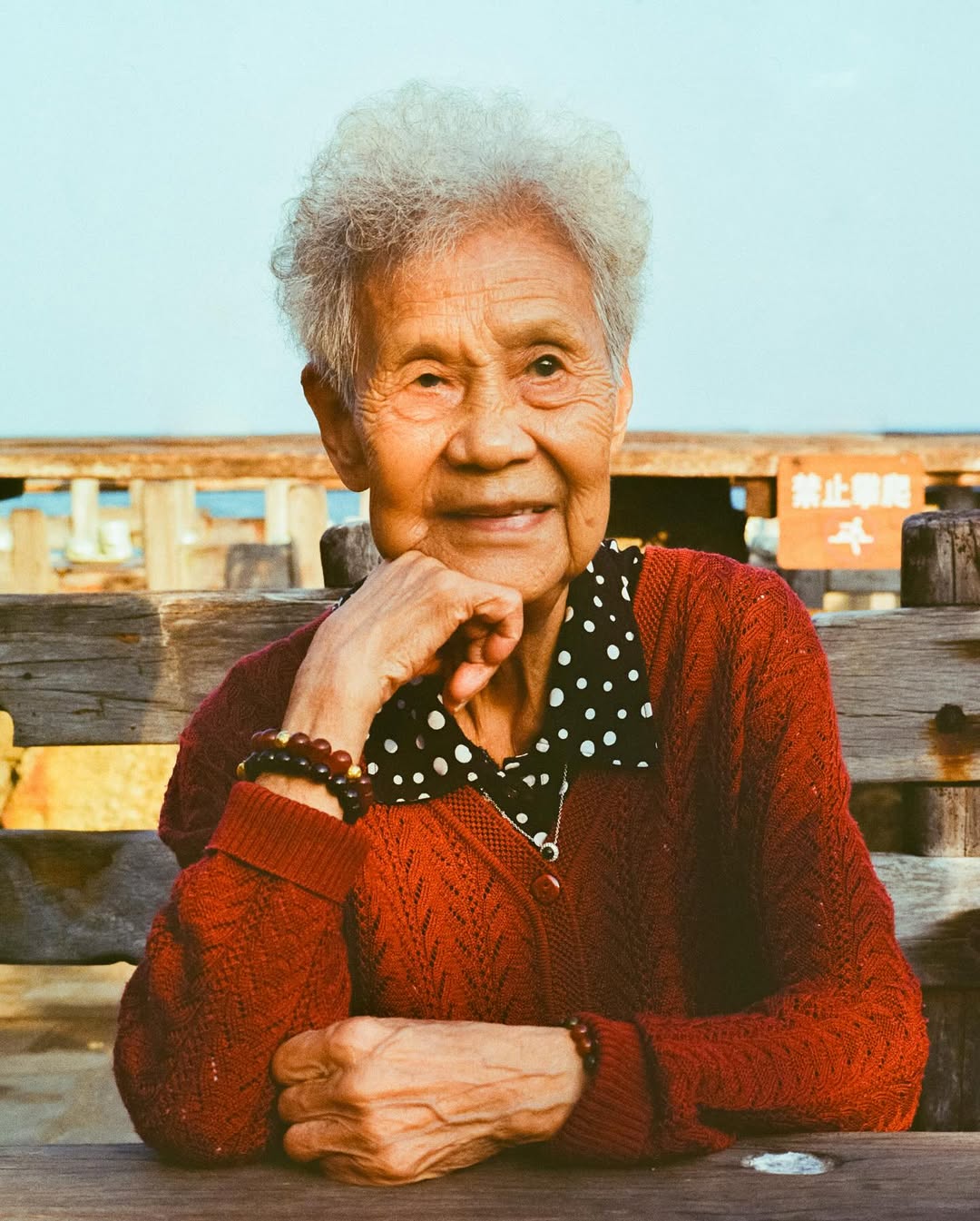 Unforgettable (China, Feb 2024) by @yanran.xiong 

“Grandma has drifted in Alzheimer’s haze for years.
She once hid money in her underwear, cursing anyone who tried to take it.
Unfamiliar places made her afraid; some nights, she tried to escape.
But always, she carried sunflower seeds to share,
and memories of dancing and singing—her youth shining through.
She no longer knows our names, yet greets each day with a radiant smile,
at peace in a world that forgets, but never dims her light. 

I want to capture these precious moments because I don’t know how many there still are.”