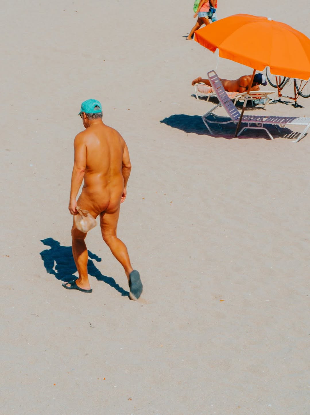 “If They Asked for Nudes” by @sofiperazzo 

“If They Asked for Nudes” was born in Miami, across from the nude beach where Sofi grew up watching from afar but never dared to enter. 

“What began in 2019 as a quiet, instinctive return to documentary photography—driven by curiosity and a meditative state of simply absorbing—turned into an exploration of self-acceptance, liberation, and how we perceive the human body. Every frame was about composition, color, humor, and the quiet irony of freedom, while also honoring the vulnerability I felt as a fly on the wall. It questions beauty norms, embraces aging, and challenges what we turn away from, while at the same time grounding me in my own authenticity—marking the beginning of my style, my palette, and the way I still see today.”