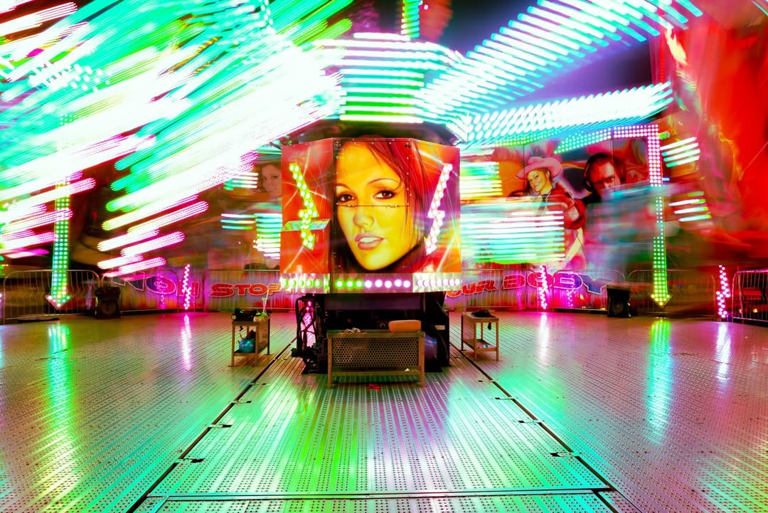 ‘Cotton Candy Cowboy,’ an ongoing project by American documentary and street photographer @perryhallphoto 

“For the past two years, I have been working on this photo project at the State Fair of Texas. Each October, I walk into this beautiful chaos of light, color, and people living out the American dream for 24 days straight. I call this project ‘Cotton Candy Cowboy’ because that’s what it is: this collision of Western mythology and State Fair sweetness, all built on the actual work holding it together.”