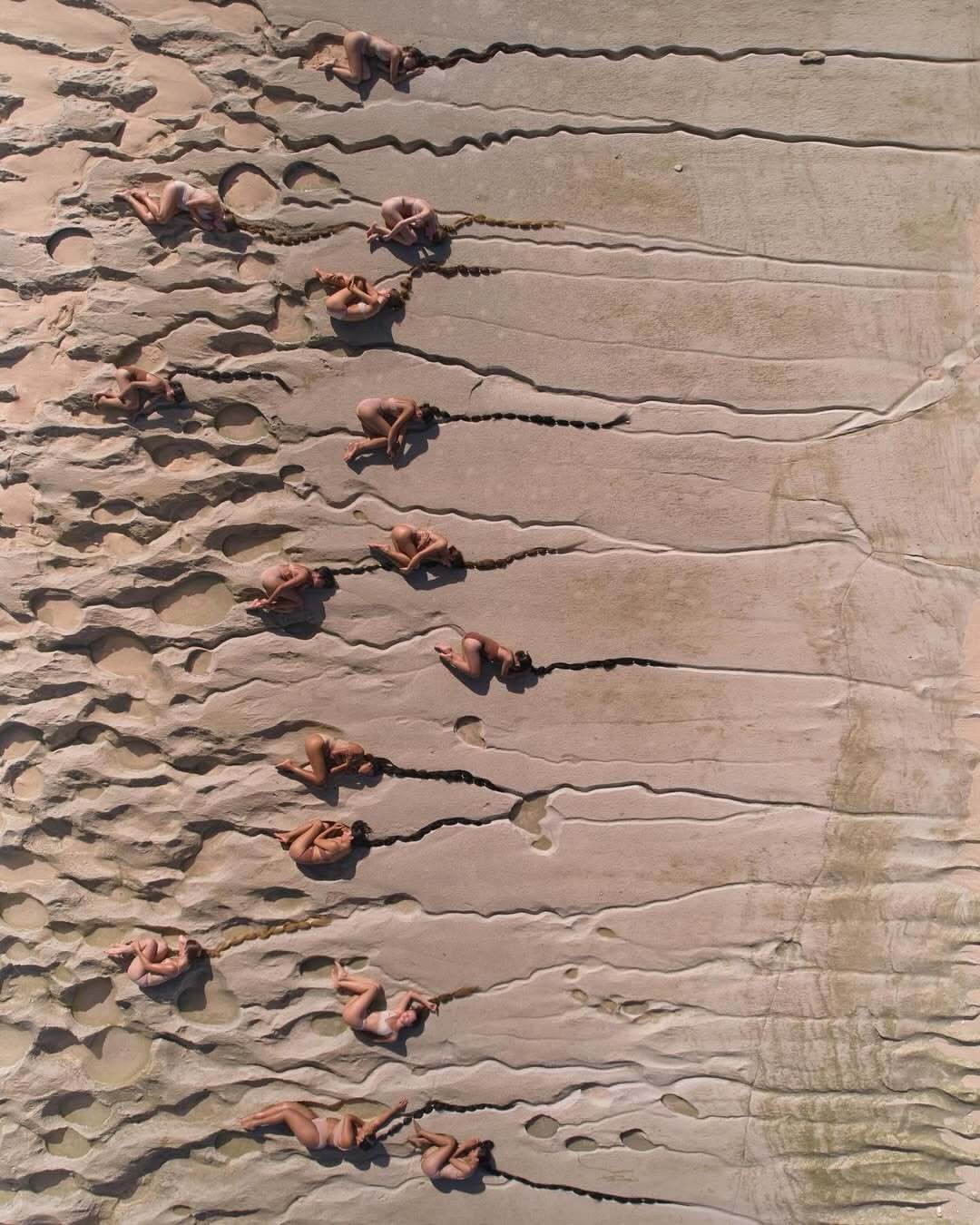 ‘Rivers of Hair’ by @nataliekarpushenko

“Women of all ages, sizes and cultures,
cradled by the reef,
their hair unraveling into ocean roots.
The sea calls, the earth listens,
as time drifts backward in quiet waves.”

In collaboration with @carinahardy.studio 
Produced by @cccaaarrrhhh
Drone assistent @romaodintsow