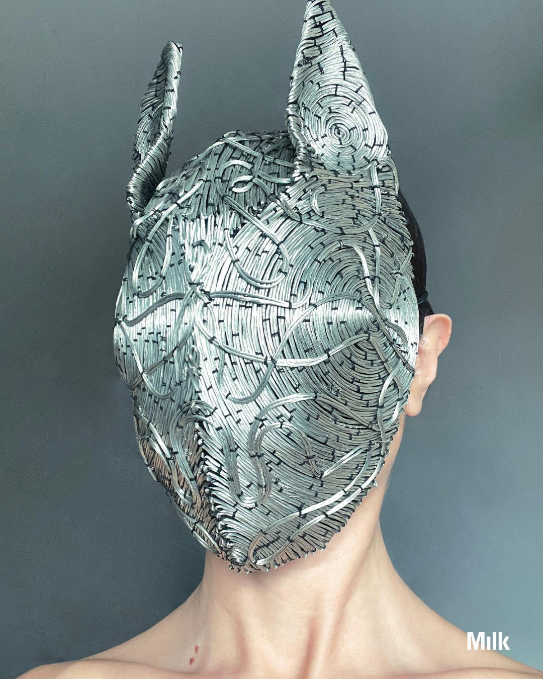Artist Spotlight: For Berlin-based multidisciplinary artist Anastasia Pilepchuk (@nastia_pilepchuk), mask making begins with the need to give form to something internal, untranslatable into language. A ritual of slowing down, following texture, letting form build itself through process. Drawing from the body, natural patterns, and material repetition, her work sits
at the threshold between object and transformation.

Fast forward 1000 years and she says, “Maybe the face itself becomes a kind of interface,
something that shifts depending on context. In a way, closer to what masks already are.”