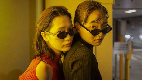 After killing their partner, two assassins ...