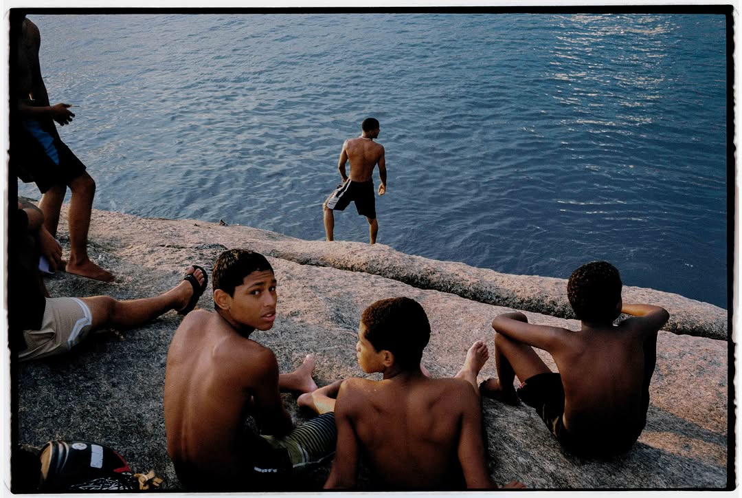 ‘Brazil Summer 2026’ captured by Brazilian photographer Rodrigo Onzi (@onziphoto). Exploring life through a 35mm camera, Onzi focuses on how light, colour, and everyday moments come together in the street. 

“My work is rooted in presence, reacting to what unfolds in front of me and finding meaning in the in-between moments. I don’t think there’s anything more fascinating than walking around and noticing life as it unfolds. When I come across scenes like these , it’s when I truly feel that life is worth it, a simple reminder of how good it is to be alive.”