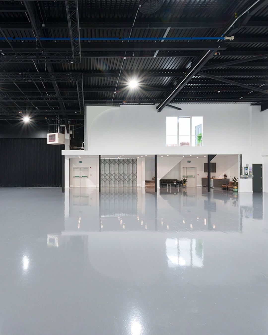 The improved Studio 3 has been re-designed without a cove creating the largest clear floor space area in the studios at 609m2.
By combining the old Studio 3 and 6 this new layout is ideal for larger productions with set builds and has drive in access from the rear carpark.
Studio 3 can also be booked with Studio 5 as it has a spacious communal area connecting the 2 studios, This space contains a fully serviced coffee bar providing barista level coffees and Speciality drinks.
 
Please contact us to book studio 3

#filmstudio #photostudio #london #studio #parkroyalstudios