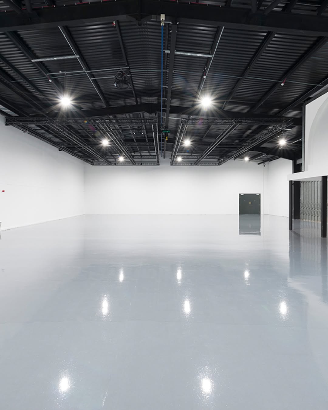 The improved Studio 3 has been re-designed without a cove creating the largest clear floor space area in the studios at 609m2.
By combining the old Studio 3 and 6 this new layout is ideal for larger productions with set builds and has drive in access from the rear carpark.
Studio 3 can also be booked with Studio 5 as it has a spacious communal area connecting the 2 studios, This space contains a fully serviced coffee bar providing barista level coffees and Speciality drinks.
 
Please contact us to book studio 3

#filmstudio #photostudio #london #studio #parkroyalstudios