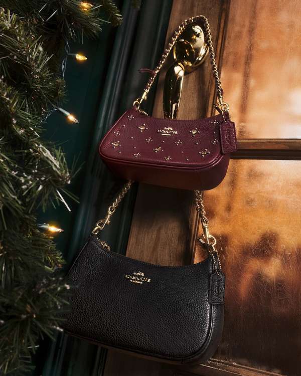 Ravyn Lenae for Coach, in a holiday scene m...