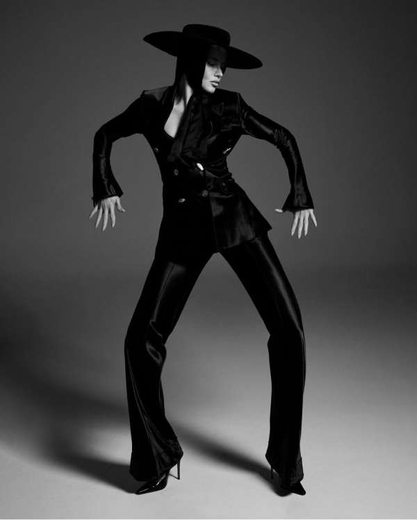 Adriana Lima, bringing her iconic supermode...