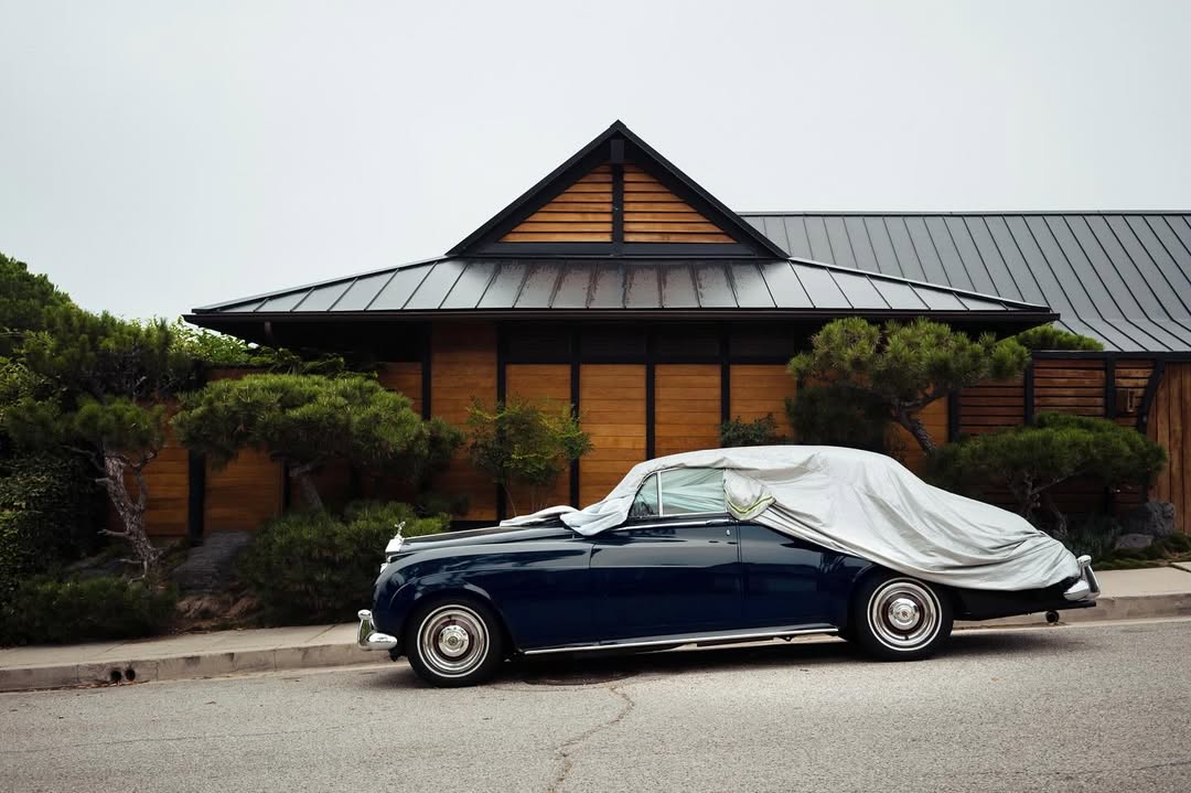 There’s something so indecent about a half-dressed Rolls Royce left outside in the elements. “Rolls” 2023  #rollsroyce @eyeforwardinc **DM for available prints**