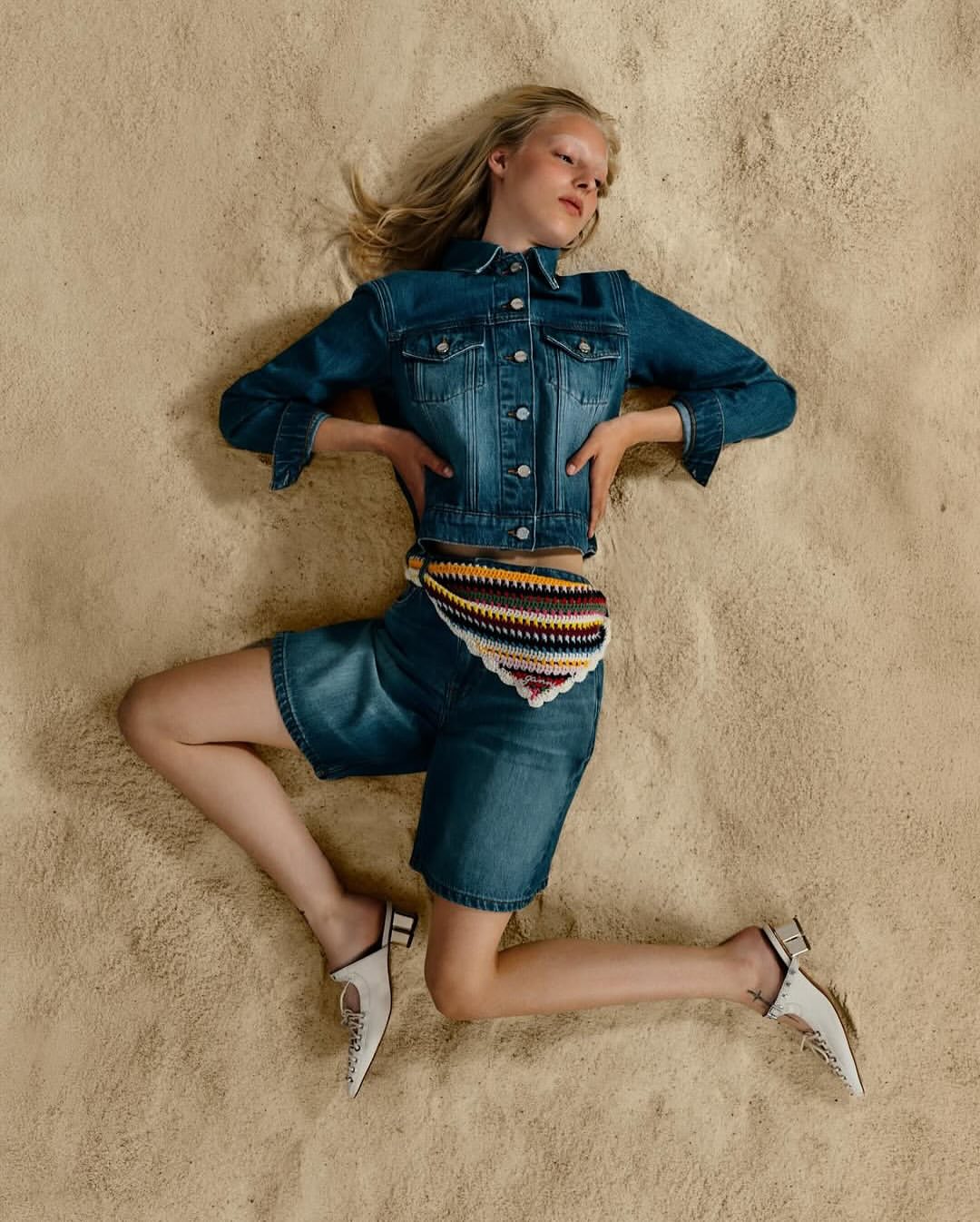 Matthieu Delbreuve for Ganni Summer 25

Ganni is a contemporary Danish women’s fashion brand known for bold, optimistic styles. Founded in 2000 as a cashmere label by Frans Truelsen, it gained fame in the late 2010s when Ditte and Nicolaj Reffstrup revamped the brand. Over the past decade, Ganni has become a cult favorite blending high-end and high-street fashion. Collaborations with brands like Juicy Couture and Levi’s have kept it relevant to current trends, especially the Y2K revival. With a strong social media presence, Ganni goes beyond selling clothes by emphasizing sustainability through detailed annual reports and establishing a new external responsibility board. The brand’s Summer 25 collection, shot by French photographer Matthieu Delbreuve, continues to reflect its playful yet conscious approach to fashion.

Creative Direction @ganni
Photographer @matthieu_delbreuve
Styling @julielucilevelut
Hair @joeburwin
Make Up @kamilavay
Set Designer @lunekuipers
Post House @sheriff.projects
#sheriffprojects