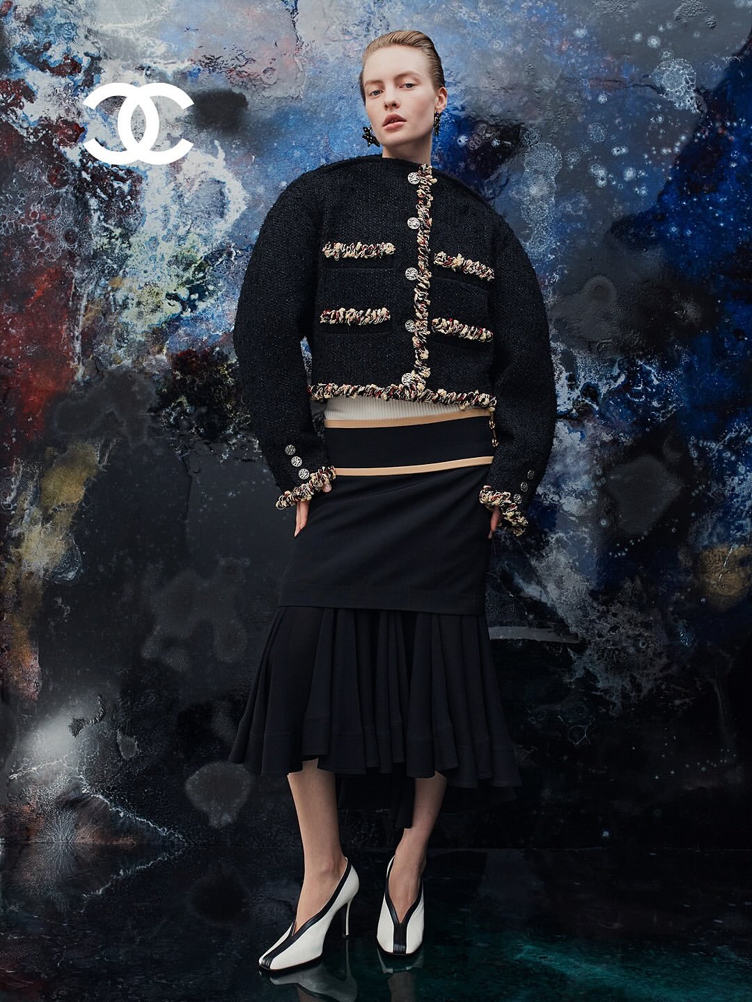 Chanel Spring Summer 2026, Paris Fashion Week

On October 6, Matthieu Blazy made a striking debut as Chanel’s new artistic director, presenting a collection that merged bold creativity with reverence for the house’s legacy. Set against a spectacular cosmic backdrop at the Grand Palais, with glowing planets and a lava-like runway, the show immediately signaled a new, visionary chapter for Chanel.
Grey flannel suits with masculine cuts paid homage to Coco Chanel’s pioneering spirit, while oversized camellias, dense pearl necklaces, and golden wheat embroidery reinterpreted the brand’s iconic symbols with modern finesse. Even the little black dress was reinvented through daring shapes and unexpected details.
Blazy closed with dramatic evening looks of sculpted petals and flowing textures, blending poetry, innovation, and emotion, a confident new beginning for the storied maison.

Creative Direction @chanelofficial @matthieu_blazy
Post House @sheriff.projects
#sheriffprojects