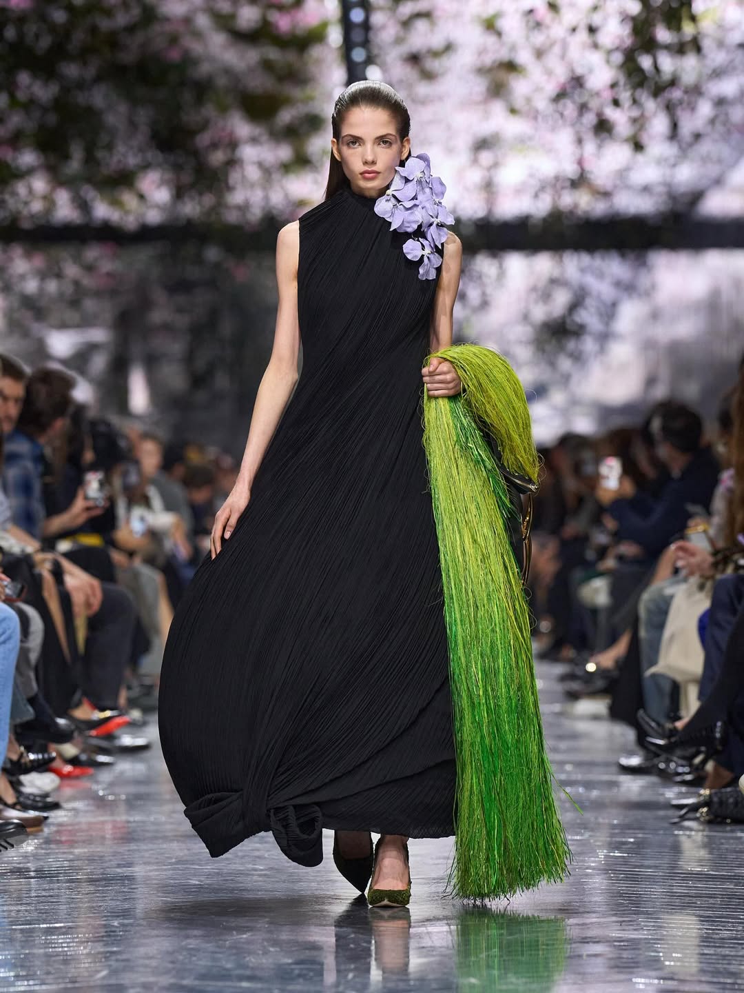 Dior Spring Summer 2026 Haute Couture
Haute couture mirrors nature: a living system in constant evolution, where experimentation and craftsmanship exist as one. For this collection, Jonathan Anderson adopts the gaze of a collector, assembling objects, memories, and references into a cabinet of curiosities where past and present meet.
Nature and artifice intertwine, cyclamen bouquets become symbols of creative transmission, while sculptural ceramics inspire fluid yet structured silhouettes. Handcrafted techniques transform the infinitesimal into the monumental: silk flowers, dense embroideries, woven tweeds, layered meshes. Each piece emerges as a singular artefact, expanding the House’s language while remaining rooted in its heritage.
Creative Direction @dior @jonathan.anderson
Styling @benjaminbruno_
Make Up @peterphilipsmakeup
Hair @guidopalau
Thank you Dior team
@gabriel_quartino
Post House @sheriff.projects
#sheriffprojects