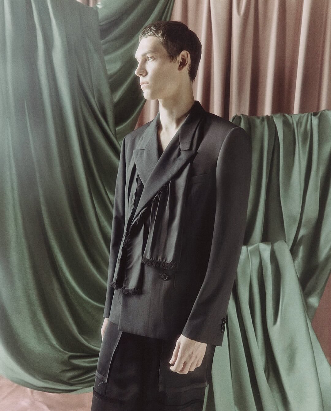 Maison Margiela Co-Ed Spring Summer 2026

Maison Margiela unveils its Co-Ed Spring Summer 2026 campaign, photographed by Mélanie + Ramon.
Rooted in the House archive, the collection explores a straight, structured silhouette shaped through reinterpretation and evolution. Tailoring is reworked with rounded sharp shoulders and deconstructed tuxedo elements inspired by the Maison’s atelier codes. Slip dresses become layered compositions, while floral motifs appear distressed, peeled, and transformed across knitwear and garments. Footwear revisits archival forms through heel-less pumps, transparent Plexi heels, and reimagined Tabi Claws. Accessories introduce the new Box Bag, finished with metallic edging. A collection balancing archival memory with contemporary construction and everyday wearability.

Creative Direction @maisonmargiela @glennmartens
Photographer @melanie_ramon
Talent @isa.brands @margaretgambles @aleksandraleksandrovichgordeev
Styling @iorio_jessica
Hair & Make Up @melanie_schoene
Post House @sheriff.projects
#sheriffprojects