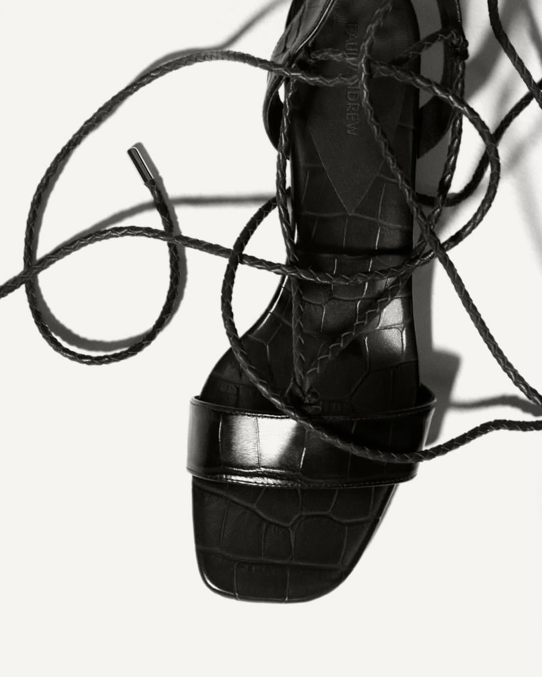 Adam Peter Johnson for Paul Andrew Season Eight
For Season Eight, Paul Andrew explores form and expression through New Attitudes, where shape, proportion, and restraint define presence and character.
Photographed in Paris by Adam Peter Johnson, the campaign balances stillness and movement, body and object, in stark, graphic compositions.
Shoes are conceived as extensions of attitude, reshaping posture, stance, and perception rather than acting as accessories.
Sculpted heels and sharp silhouettes subtly transform the way the body occupies space.
The collection introduces a youthful, instinctive energy, offering a renewed perspective on the Paul Andrew woman.
For high summer, raffia textures, hand-tied bows, and jewel-like heels bring softness, light, and architectural clarity to the silhouette.
Creative Direction @paulandrew
Photographer @adam_peter
Talent @annaviksoe @annefloorwetemans @romanenkokiril
Creative Directors @nicburdekin @lucas_lefler
Styling @xeniamaysettel
Make Up @thierry.do.nascimento
Hair @shioritakahashi
Nails @emelinemorellet
Digital Capture @sheriff.projects
#sheriffprojects