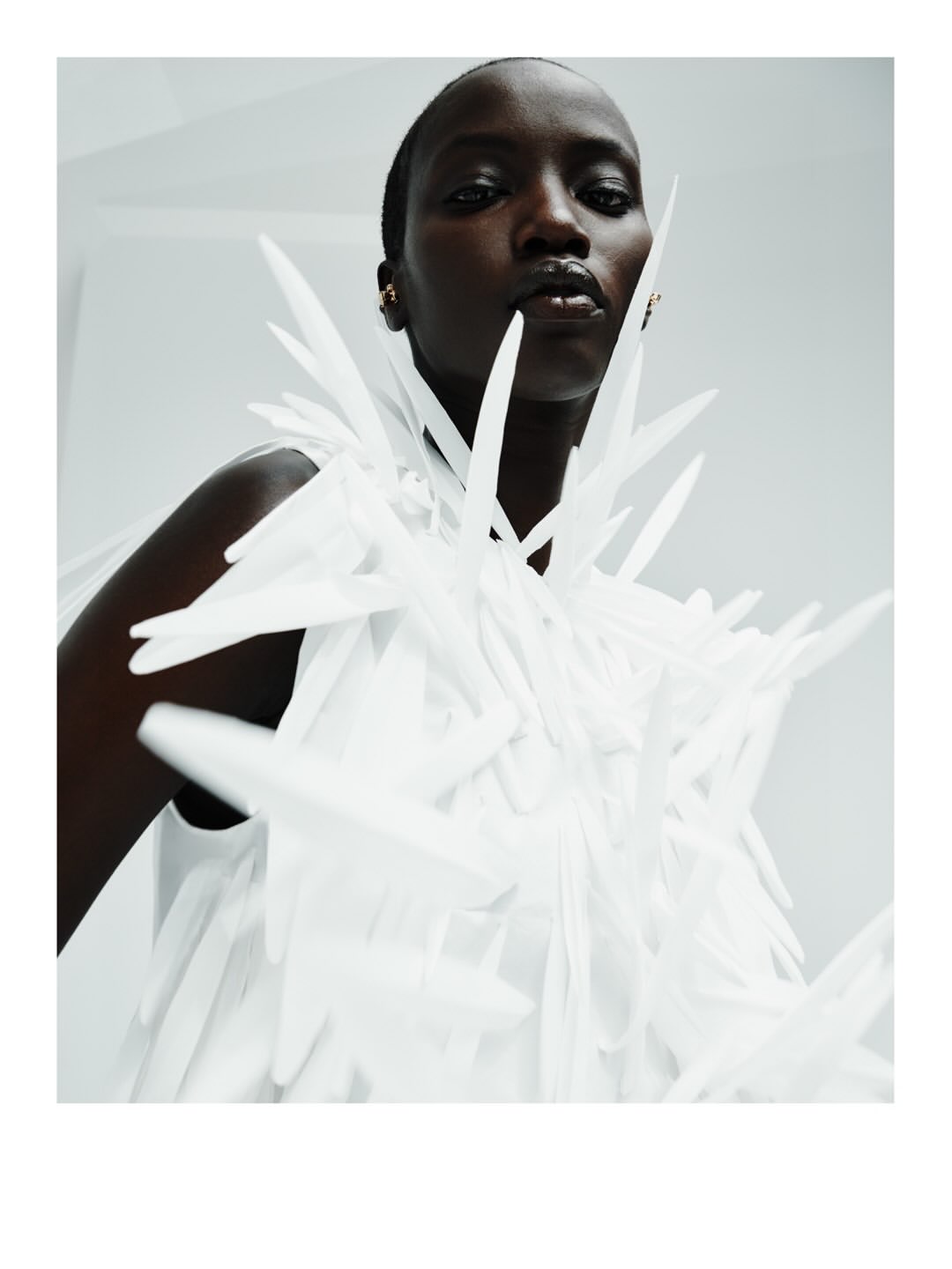 Balenciaga Spring 27 Collection

For Spring 2027, Pierpaolo Piccioli reimagines Balenciaga’s couture legacy through a study of freedom, movement and form.
Built around the concept of the “unsized”, the collection places the body at the center of creation, with fluid silhouettes shaped by fabric rather than structure. Featherlight materials, softened tailoring and reengineered house signatures blur the boundaries between couture and everyday dressing.
Photographed by Robin Galiegue at the threshold of Balenciaga’s historic Avenue George V headquarters, the lookbook captures a dialogue between heritage and reinvention, structure and ease, reality and imagination.

Creative Direction @balenciaga
Photographer @robingaliegue
Styling @imruh
Make Up @thomasdekluyver
Hair @benjaminmullerhair
Set Design @olivia_aine_
Post House @sheriff.projects
#sheriffprojects